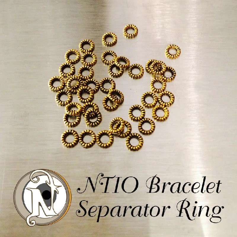 2 Gold NTIO Separator Ring