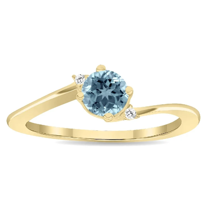 Women's Round Shaped Aquamarine and Diamond Wave Ring in 10K Yellow Gold