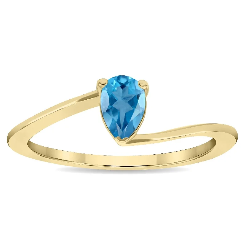 Women's Solitaire Pear Shaped Blue Topaz Wave Ring in 10K Yellow Gold